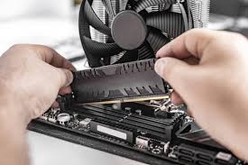 Hands repairing a circuit board with precision tools