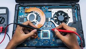 Laptop hinge being replaced during repair